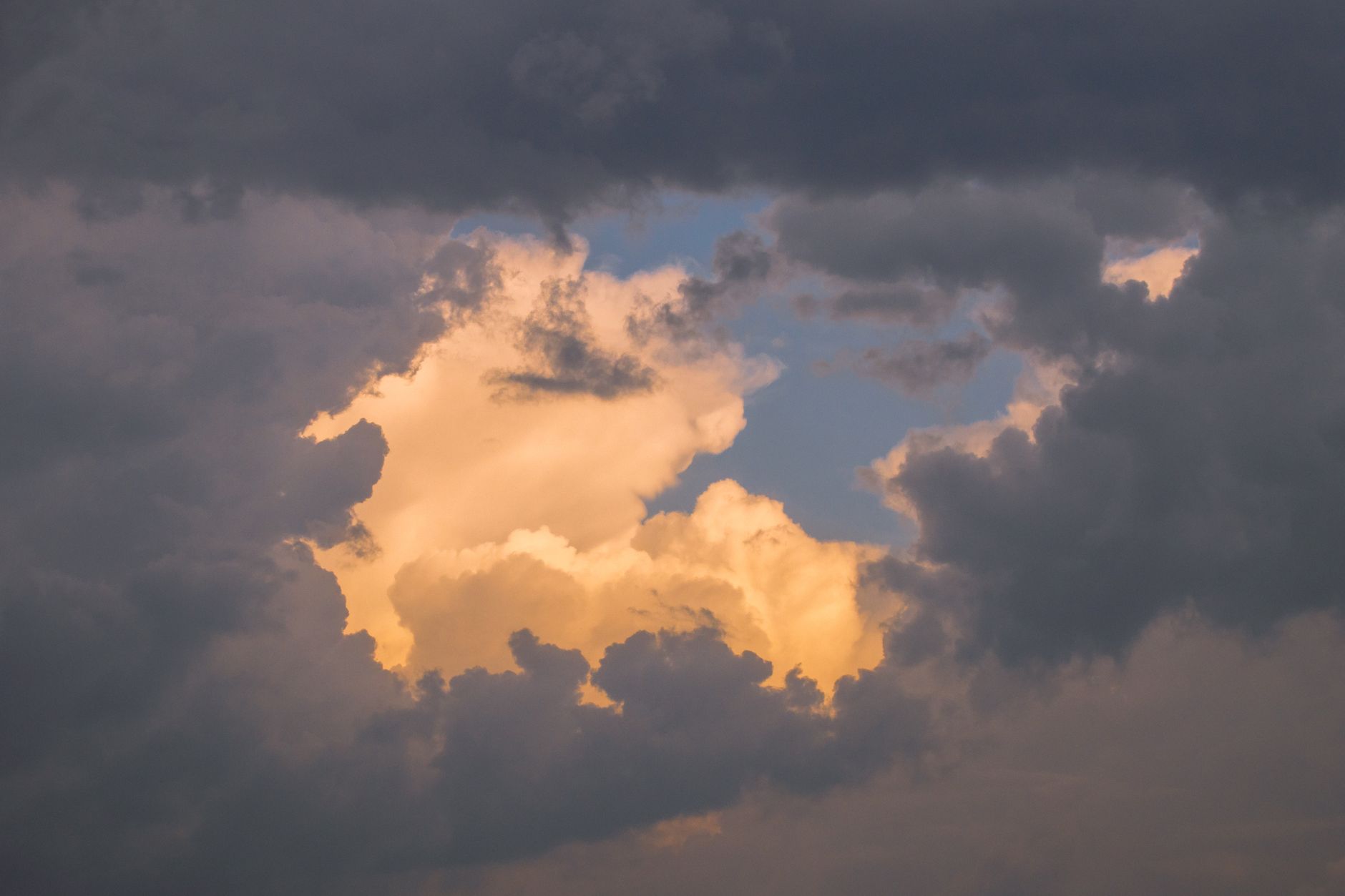 ethereal golden clouds at dusk